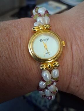 Prestige Gold Tone Freshwater Pearl Ruby And Peridot Stone Chip Watch 7"